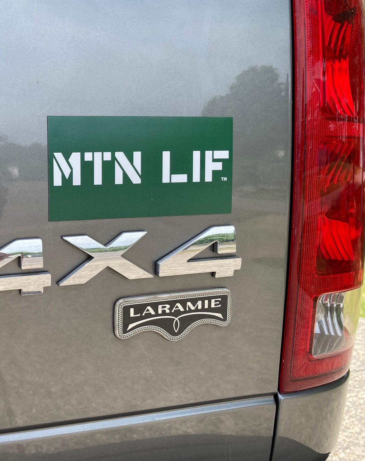 MTN LIF™ car MAGNET WHITE on dark green 3x6" Major font