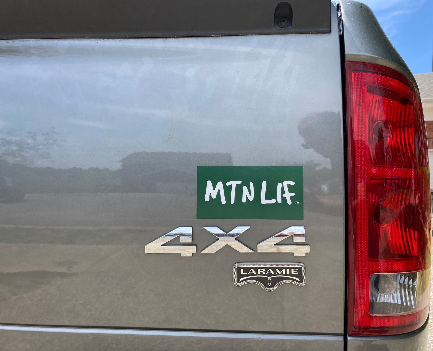 MTN LIF™ car MAGNET WHITE on dark green 3x6" Good font